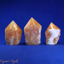 China, glassware and earthenware wholesaling: Orange Calcite Cut Base Point