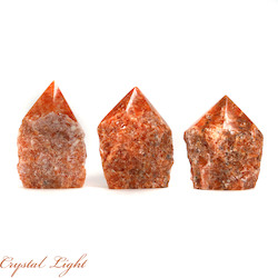 China, glassware and earthenware wholesaling: Orange Orchid Calcite Cut Base Point