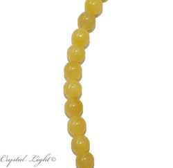 China, glassware and earthenware wholesaling: Orange Calcite 12mm Round Beads