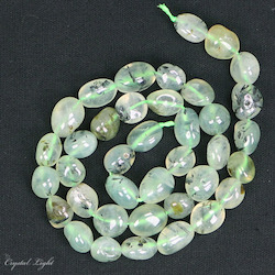 China, glassware and earthenware wholesaling: Prehnite Tumble Bead