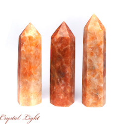 China, glassware and earthenware wholesaling: Orange Orchid Calcite Polished Point