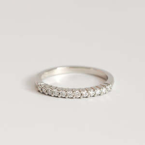 Single Claw Diamond Wedding Band in Platinum